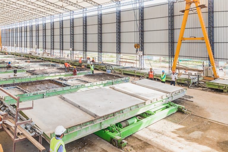 Precast wall panel production line with panels on the table