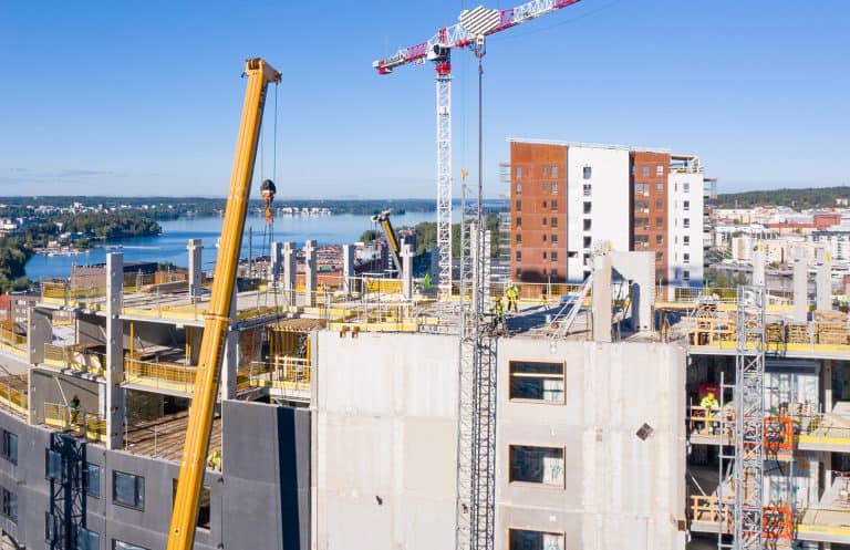 Kansiaareena. a huge apartment building and arena built above railway tracks, under construction in Tampere, Finland