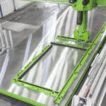 Robot for automatic shuttering in precast wall production