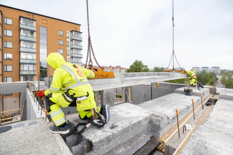 Installing a bathroom slab on a construction site.