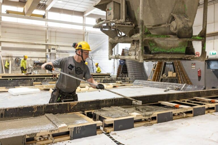 Concrete and finish to manufacture a precast brick facade.