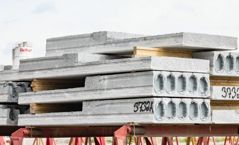 Recessed bathroom slabs on a precast product stockyard.