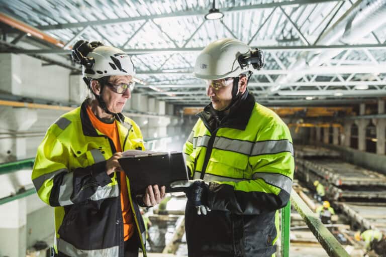 People discussing how to improve precast production further.