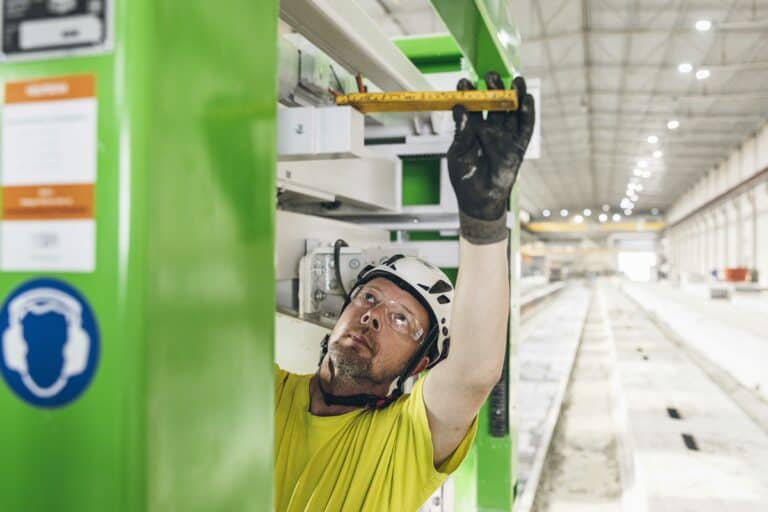 Elematic service engineer visiting a customer's hollow core precast plant